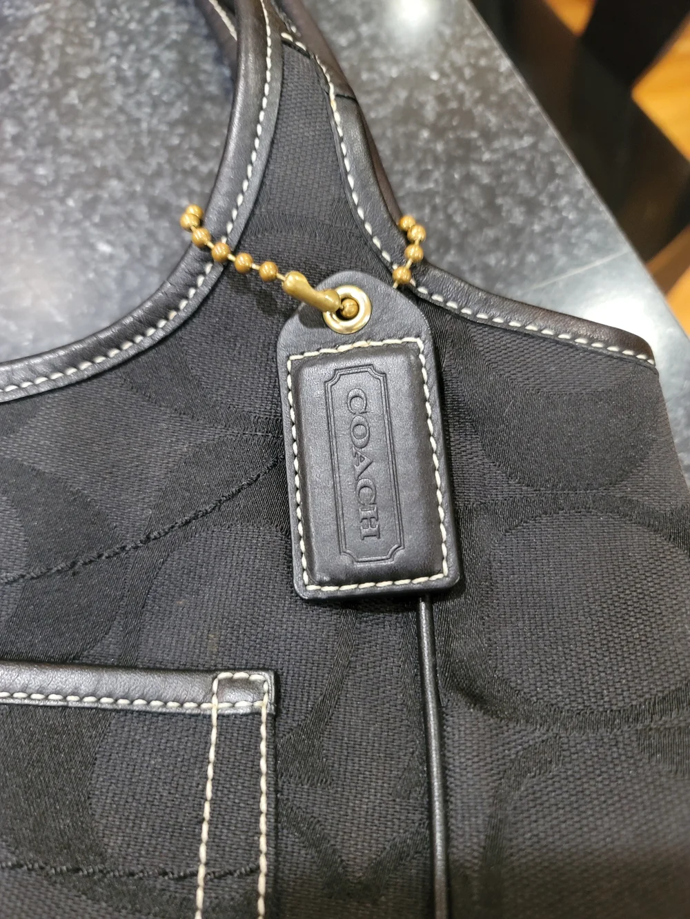 Coach Black Signature Canvas Shoulder Bag with Gold-Tone Accent